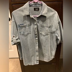 Vicki size small denim button up blouse.